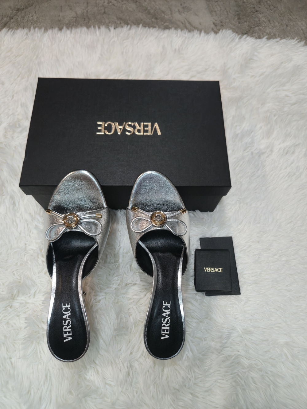 Versace Metallic Silver Slide Mules with Gold Medusa Bow
